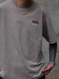 UND 26SS SLIENT DRIVE BACKPIC TEE