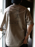 UND 26SS SLIENT DRIVE BACKPIC TEE